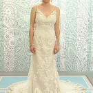 This intricate lace sheath has a plunging V-neck and very thin straps.