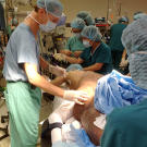 Dr. McKinnon is based in Chicago, and he has removed life-threatening tumors from patients around the world. He traveled to Vietnam to operate on Hai.