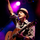 Musician Jason Mraz writes upbeat tunes. He and his friends want Kat to tattoo them with the words, "Be Love," plus a circle and a triangle on his arm.