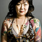 Comedian Margaret Cho wants an art nouveau peacock tattoo from Kat. Margaret loves peacocks and believes they are a symbol of beauty.