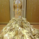 Kayla's 24-karat gold dress comes with a matching bolero jacket.