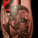 Tim tattoos the lead singer of Slipknot in the memory of his lost band mate.
