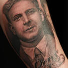 Tim tattoos a portrait of John's father to memorialize his burger joint named after his "Pops."