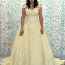 Floral appliques are among the most feminine embellishments a bride can add to her wedding dress.
