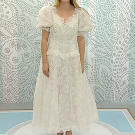 Nina and her mom were as close as a mother and daughter could be, but that didn't mean this bride would be strong-armed into wearing this $100 catalog dress from the '80s. The