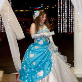 A queen of hearts makes a grand entrance at the Valentine's Day Ball.