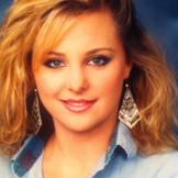 Carmindy in high school, she's got that 80's glam look down!
