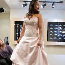 A blush satin gown with silver-beaded bodice is cool enough for a winter wedding and fresh enough for a springtime event.