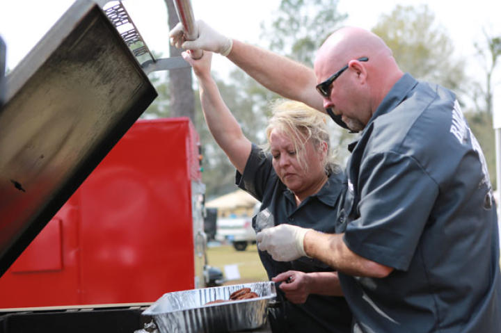 Chuck and Sandy Baker check their pit.