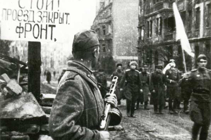 Delegation of German officers walking for negotiations before capitulation of Festung Breslau, May 6th, 1945. The Russian siege of Breslau had lasted three months. The sign reads