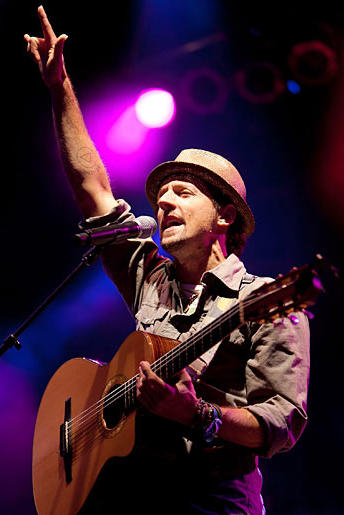 Musician Jason Mraz writes upbeat tunes. He and his friends want Kat to tattoo them with the words, "Be Love," plus a circle and a triangle on his arm.