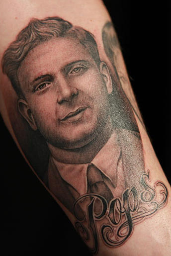 Tim tattoos a portrait of John's father to memorialize his burger joint named after his "Pops."