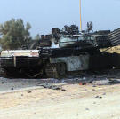 On the road to Baghdad, a US Marine Corps M1 Abrams Main Battle Tank lay destroyed after a firefight with Iraqi troops, during Operation Iraqi Freedom.
Watch video of the
