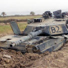 A destroyed Abrams M1A1 Main Battle Tank near Sayyid Abd, Iraq during Operation Iraqu Freedom April 2003.
Watch video of the
