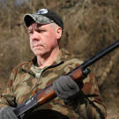 Wild Bill stands by, prepared for anything.