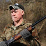 Wild Bill stands by, prepared for anything.