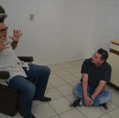 Lou Amoroso tells Scott Menaged stories of his childhood, after being reminded by furniture left behind at a newly purchased home.