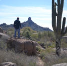 Doug Hopkins checks out the scenic view from the backyard at the house at Balancing Rock.