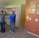 Partners John Ray and Jace Johnson inspect the interior of their newly acquired property.