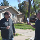 Scott Menaged and Doug Hopkins enjoy some ice cream before bidding on an auction property.