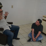 Lou Amoroso tells Scott Menaged stories of his childhood, after being reminded by furniture left behind at a newly purchased home.