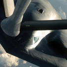 A B-2 Spirit bomber gets up close and personal with a KC-135 Stratotanker during a deployment to Andersen Air Force Base, Guam
