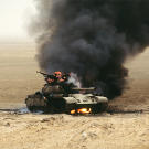 An Iraqi Type 69 tank burns after an attack by the 1st United Kingdom Armored Division during Operation Desert Storm, February 1991.
Watch video of the