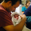 Proud papa Josh says hello to Marcus.