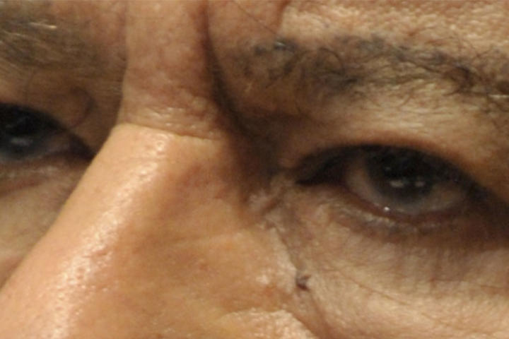Close up of Muammar Gaddafi