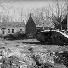 February 1918, wreck of a British tank. Notice the damage done to the surrounding structures.
Watch video of