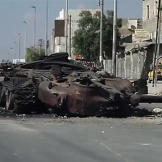 A blown out tank in Aleppo during the Syrian civil war, October 6, 2012.
Watch
