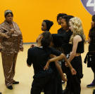 The kids' choreographer and manager, Sean and Tracey, give them a pep talk.