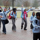 The kids are full of energy and excitement on competition day.