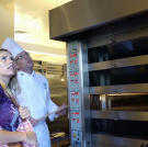 Iva visited the Culinary Institute of America as a prospective student. She realized that the craft her mother taught her would only take her so far professionally -- and this visit confirmed that she has a lot to learn about the tools and processes in baking. "That food is gorgeous," she said in awe, "I can't believe it." While her visit was overwhelming, it gave Iva a lot to think about for her future.