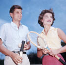 John and Jackie, engaged to be married, play tennis together.