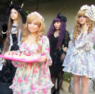 Emily's dolly friends arrive for the tea party.