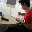 Justin uses this doll as a model for aesthetic perfection.