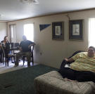Christina sits apart from her family at mealtime. "My family doesn't realize how hard it is to watch them eat what I want," she says.