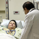 Dr. Nowzaradan visits Christina's bedside.