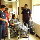 Olivia confers with the hospital staff testing her during her 48-hour observation period.