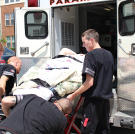 Even after her weight-loss surgery, Penny is still unable to walk and requires a team of professionals to move her.