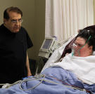 Dr. Nowzaradan consults with Penny at her hospital bedside.