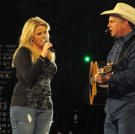 Trisha Yearwood and Garth Brooks perform in Nashville in 2010.