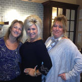 Contest winner Michelle Kelley and her guest with Theresa.