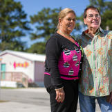 Gina and Roy outside their beauty shop.