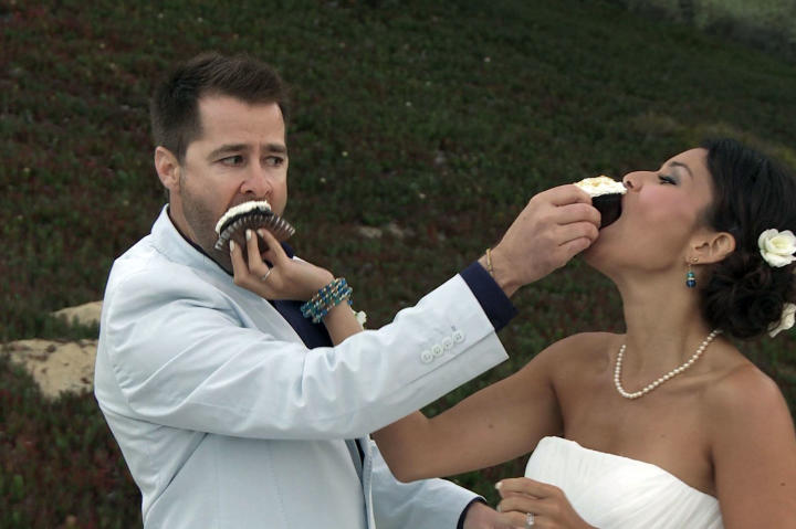 Justin and Evelin aren't shy about smashing a little cake in each other's faces at the reception.