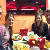 Derick and Jill share a meal with friends.