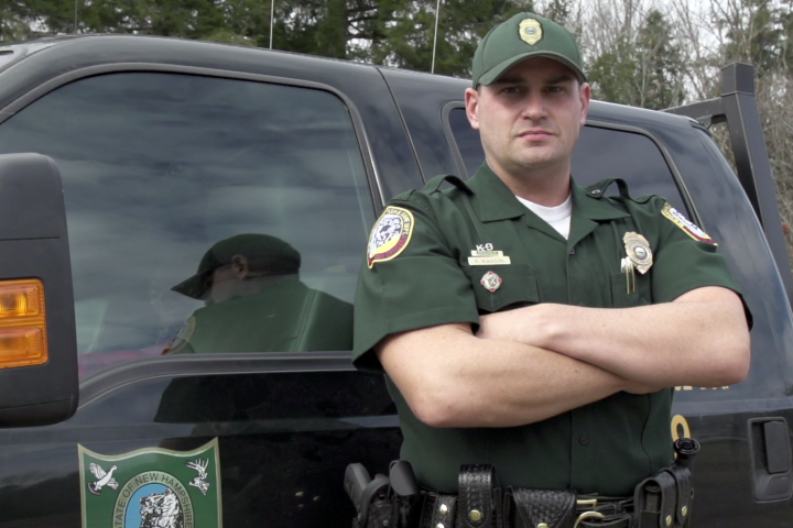 NWL NH Arms crossed by truck