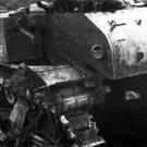 A US Marine tank crewman examines the battle damage to his vehicle which put it out of commission while fighting the Japanese in the Battle of Munda Point, late July 1943.
Watch video of the