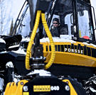 Josiah Heiser in the forwarder. Forwarders are used to move logs from the location where they are cut.